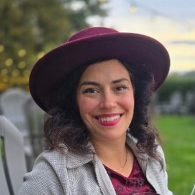 Alexis in a burgundy hat